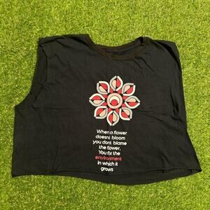 Graphic sleeveless 'When A Flower Doesn't Bloom' quote tee